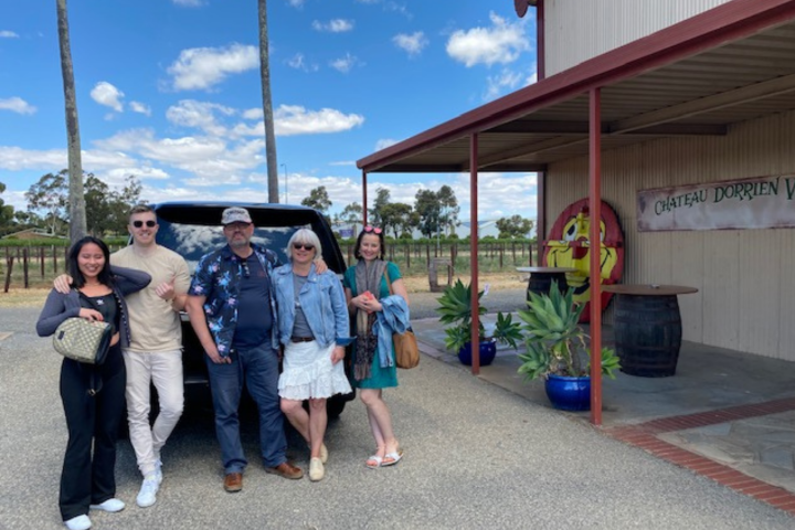 A group of people at a winery