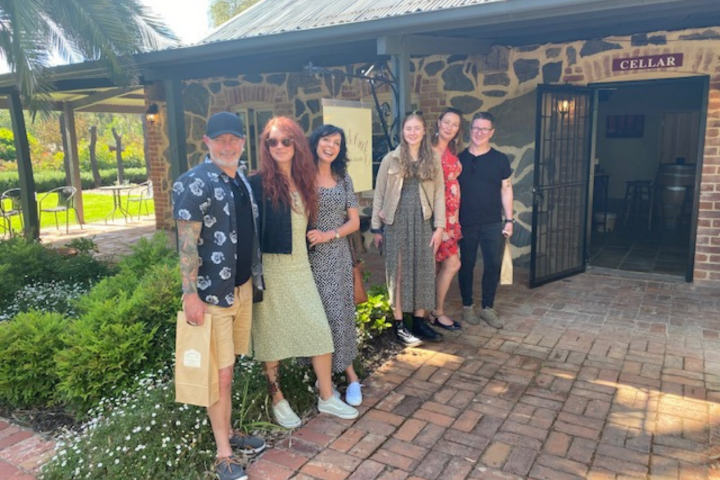A group of people at a winery