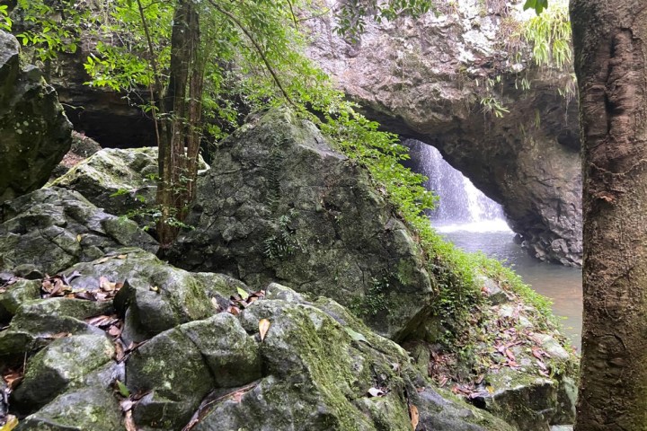 a group of people on a rock