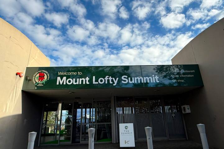 Entrance to Mount Lofty Summit under a cloudy sky.