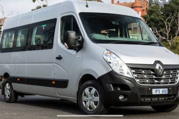 a van parked on the side of a road